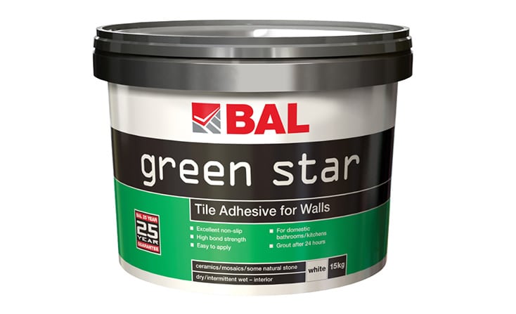 Green star-shaped stone mosaic tile arrangement on a white background